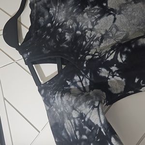 Open shoulder tie dye black and gray soft cozy sweatshirt.